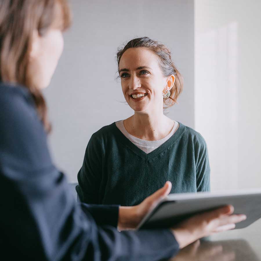 Woman meeting female banker for financial advice